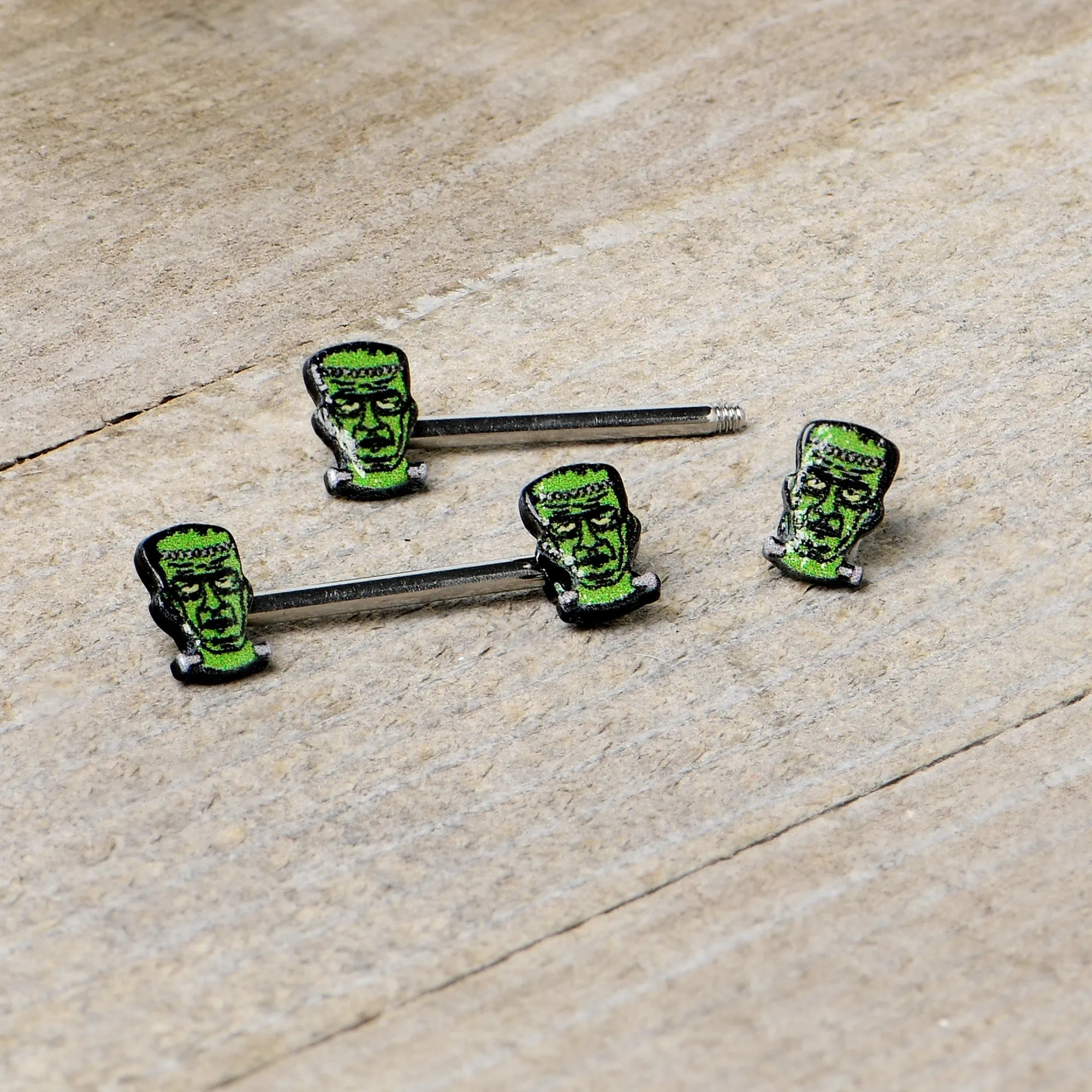 14 Gauge 9/16 Frankenstein Head Green Glow in the Dark Nipple Ring Set