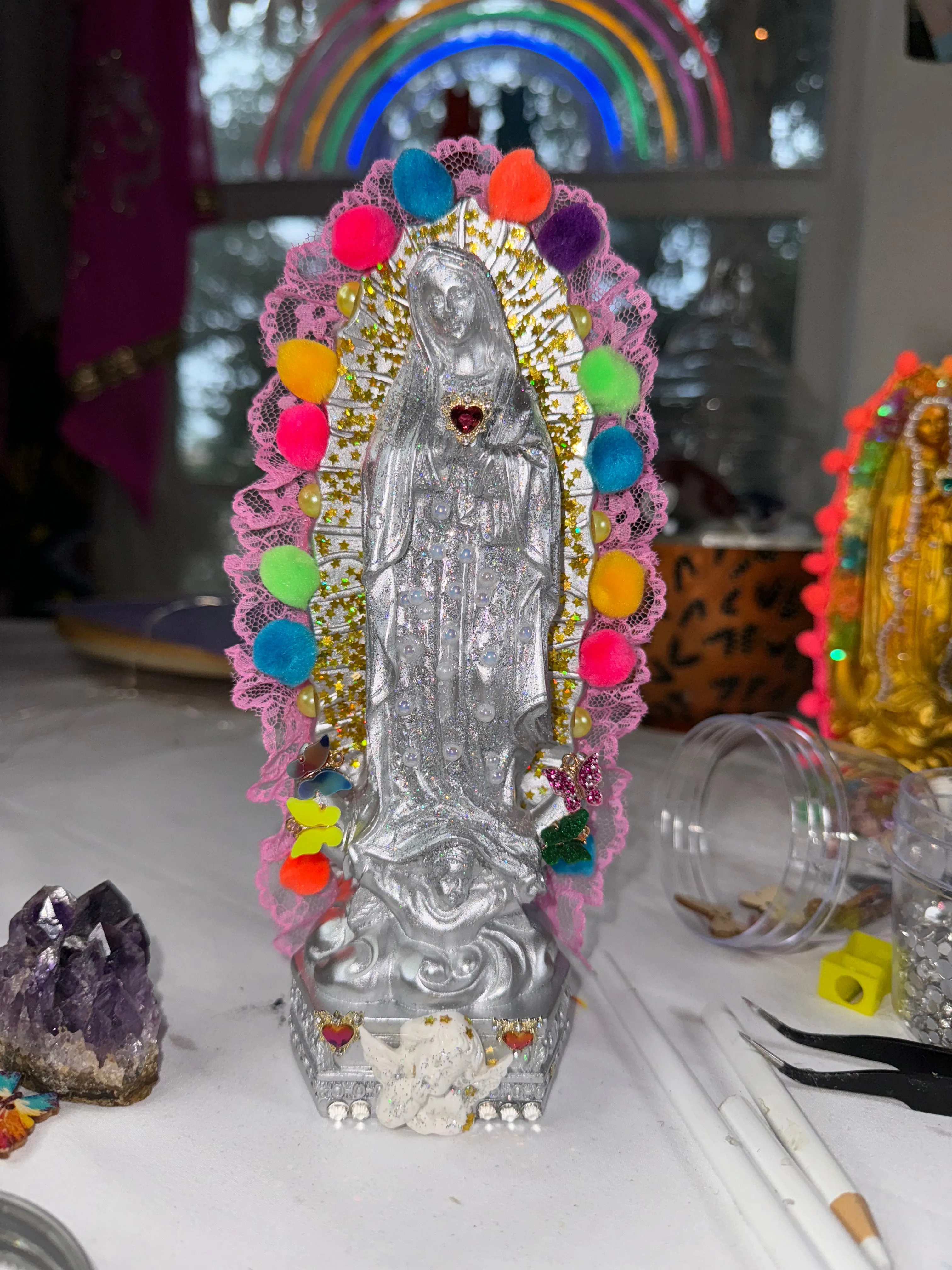 Silver Virgen de Guadalupe statue
